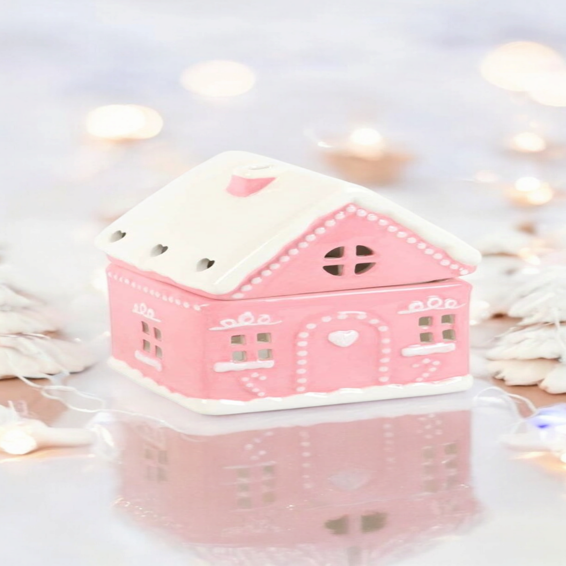 Roze peperkoek huisje kerst